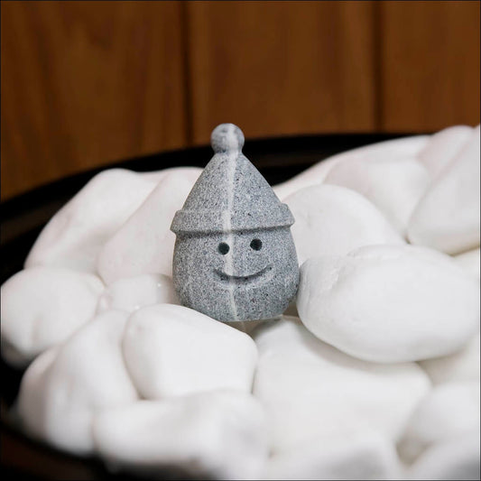 Hukka Sulo Soapstone Sauna Elf with Holiday Hat - 02_lifestyle_stones.jpg