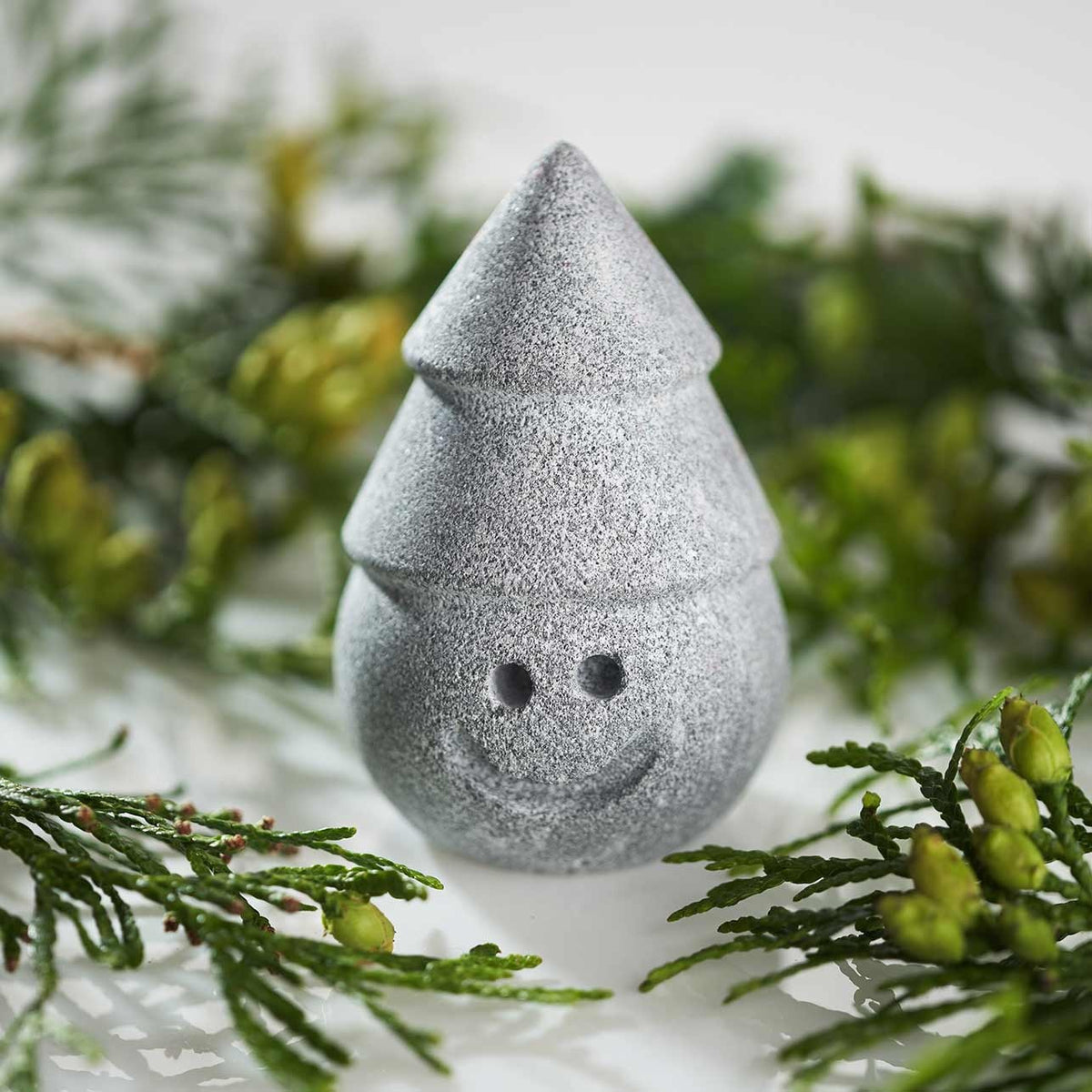 Hukka Jolle Soapstone Sauna Elf with Stacked Cone Hat - 02_lifestyle_stones.jpg